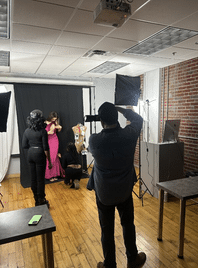 Photographer and people modeling at a photo shoot - Siba - Stevens Institute of Business Photographer and people modeling at a photo shoot